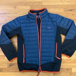 Patagonia Dark Blue Jacket with Bright Orange Trim